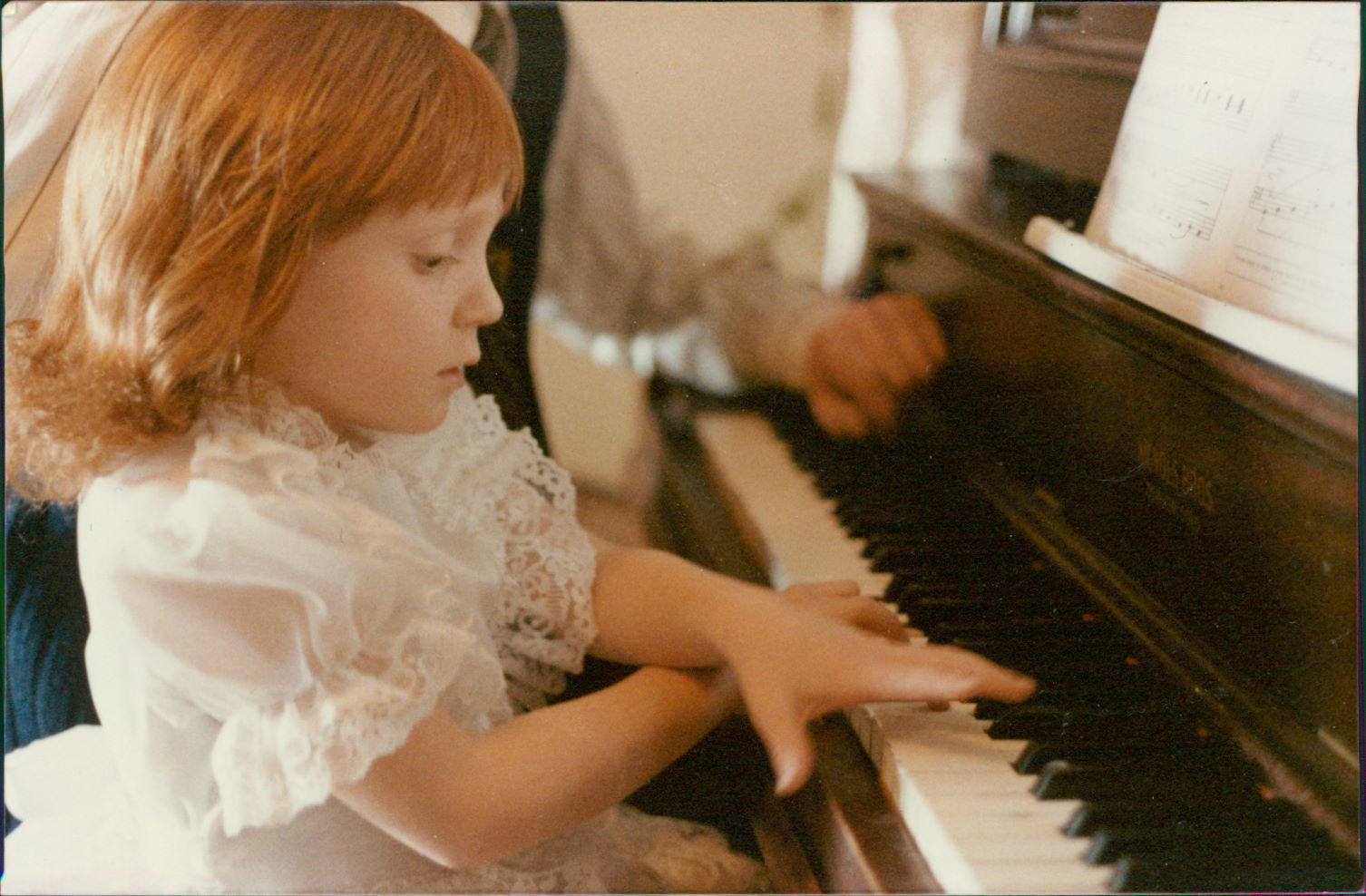 Chanté at the piano as a child
